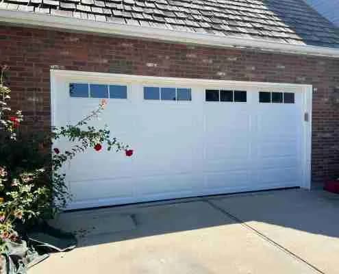 New white garage door with windows installed